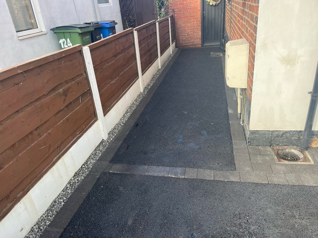 Tarmac side passage with a block paved border, George Lane, Bredbury, Stockport