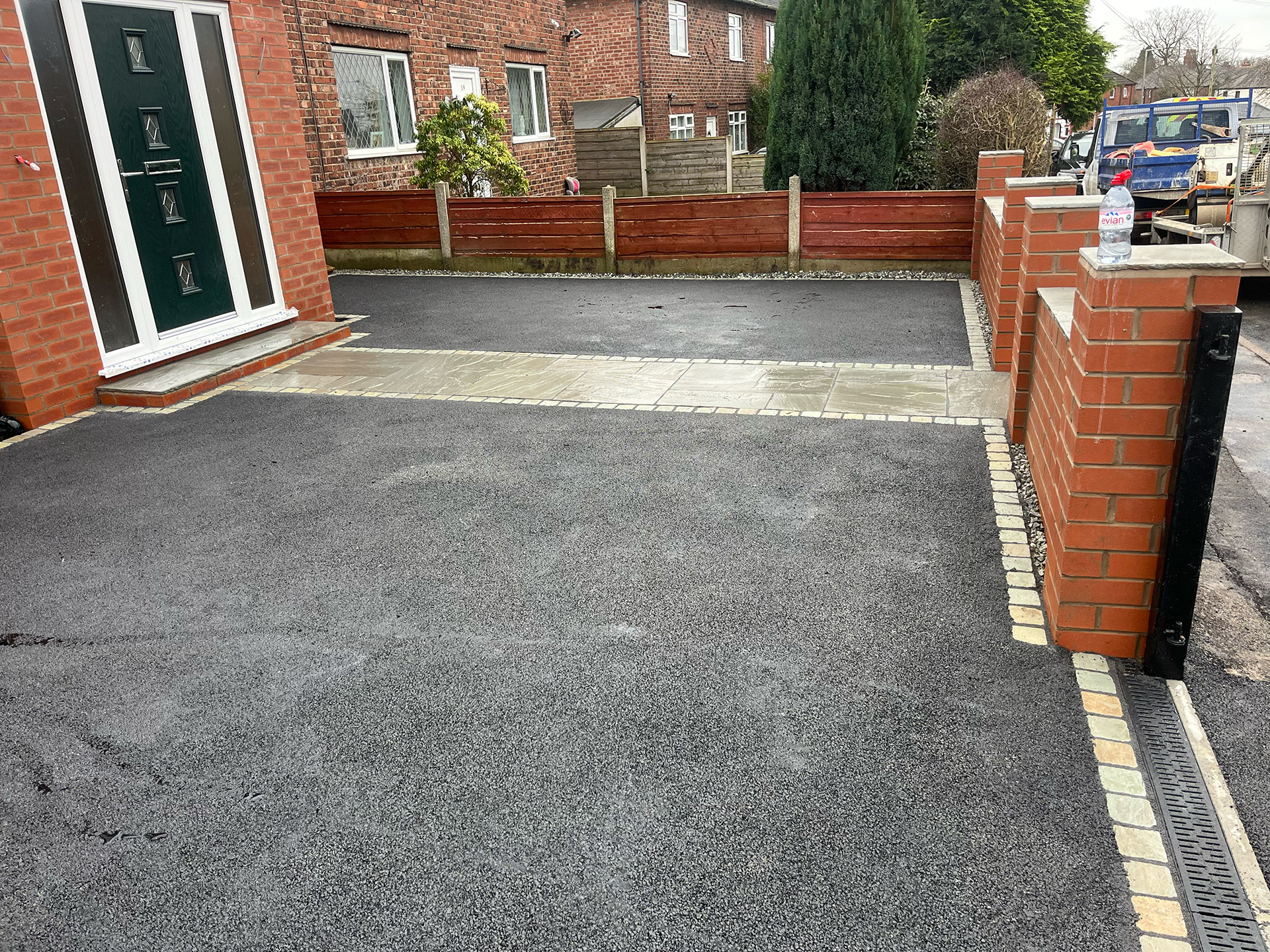 Tarmac driveway with pewter cobblestone border. Indian stone pathway Tarmac driveway with pewter cobblestone border. Indian stone pathway