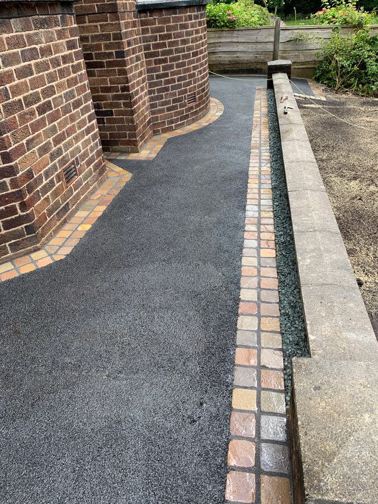 Tarmac pathway with border
