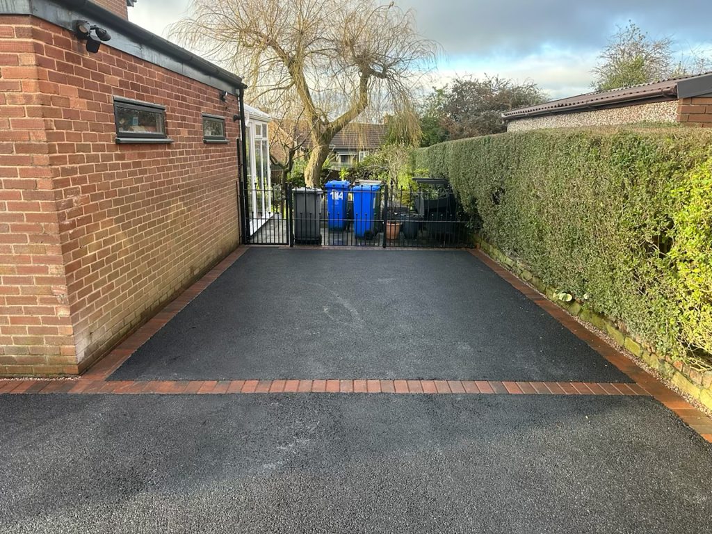 New tarmac driveway and gate entrance